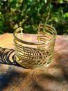 Pulsera brazalete de acero con tiras