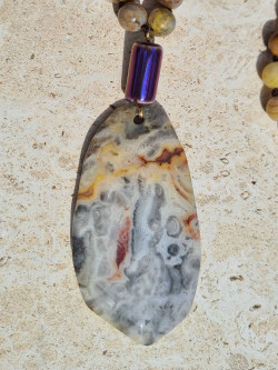 Long necklace of natural jasper ochre stones