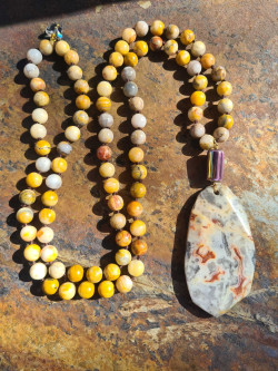 Long necklace of natural jasper ochre stones
