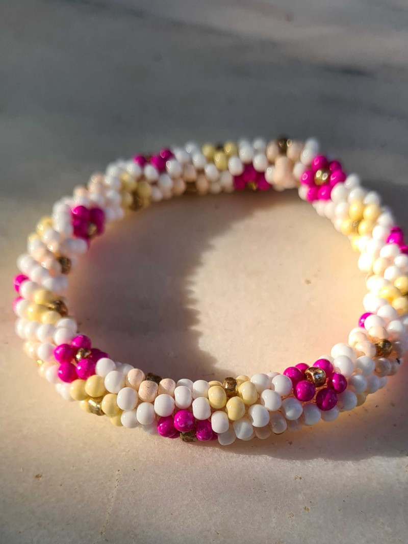 Elastic bracelet with rock crystals and flowers in PEYOTE technique