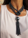 Long necklace of mother-of-pearl beads with tassel