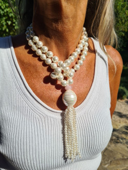 Long necklace of mother-of-pearl beads with tassel