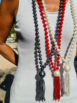 Long necklace of mother-of-pearl beads with tassel