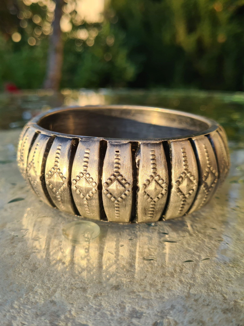 Rigid carved ethnic bracelet, antique silver