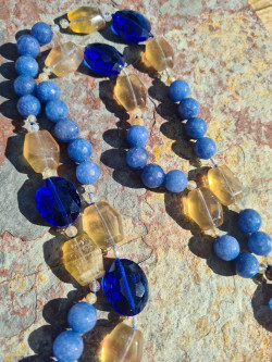 Long necklace of blue agates and amber agate pendant