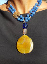 Long necklace of blue agates and amber agate pendant