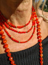 Long necklace of natural orange stones and golden hematite pieces