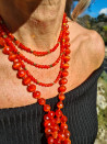 Long necklace of natural orange stones and golden hematite pieces