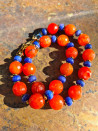 Choker with natural stones: orange agates and deep blue jade