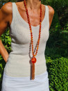 Long necklace of orange agates with pendant and tassel