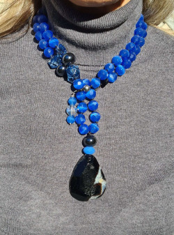 Long necklace with blue cat's eye and black agate pendant