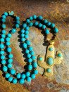 Long ethnic necklace with turquoise howlite and cactus pendant