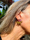 Gold earrings with cat's eye and gold leaves