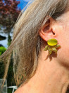 Gold earrings with cat's eye and gold leaves