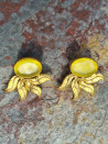 Gold earrings with cat's eye and gold leaves