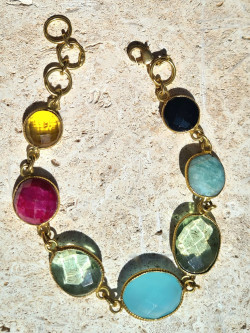 Bracelet of semi-precious stones with bronze edge