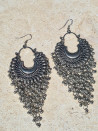 Ethnic pendant made of aged zamac