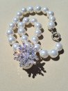 White mother-of-pearl choker with star pendant and cubic zirconia