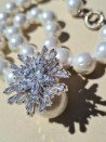 White mother-of-pearl choker with star pendant and cubic zirconia