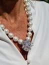 White mother-of-pearl choker with star pendant and cubic zirconia