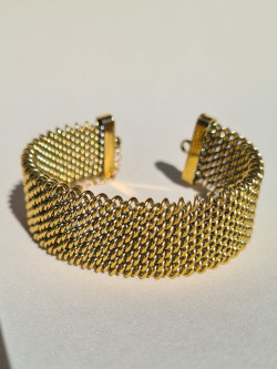 Rigid Mayan-style bracelet in gold-plated stainless steel