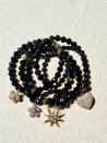 Elastic bracelet made of golden obsidian with a cubic zirconia pendant