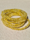 Elastic bracelets made of faceted agates in various colors
