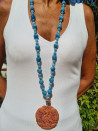 Long necklace of agates and red jade medallion