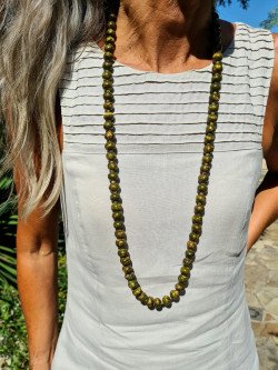 Long necklace of khaki-dyed bone with yellow spots