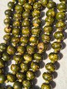Long necklace of khaki-dyed bone with yellow spots
