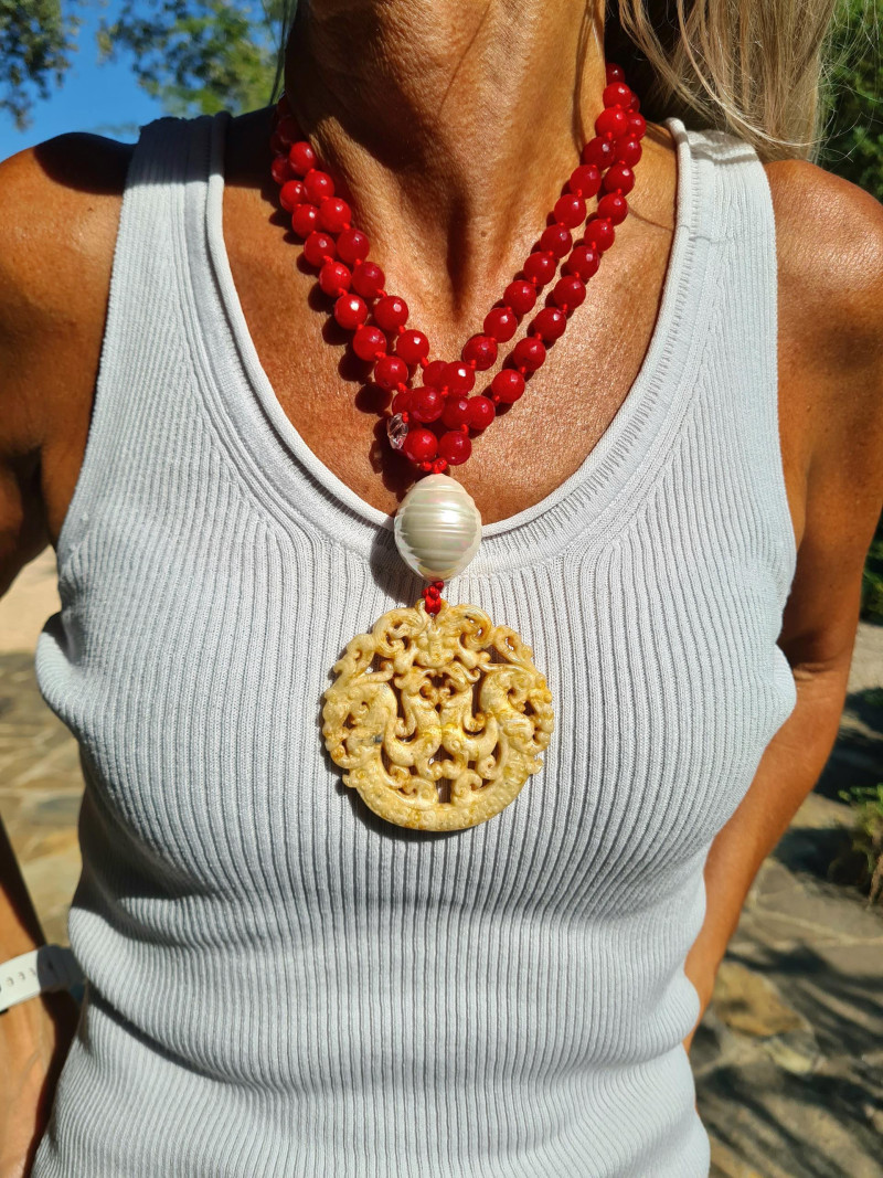 Long red howlite necklace with turquoise heart pendant