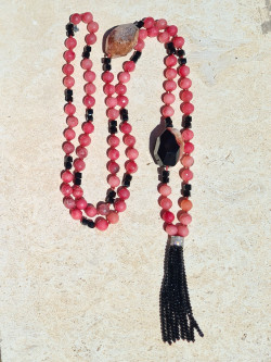 Long pink agate necklace with black Czech crystals and a tassel
