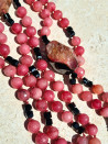 Long pink agate necklace with black Czech crystals and a tassel