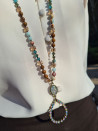 Long necklace of agate and crystals with a handmade oval pendant
