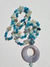 Long necklace of blue and gray agates with agate circle pendant