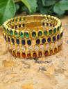 Rigid gold bracelets with colorful cubic zirconia