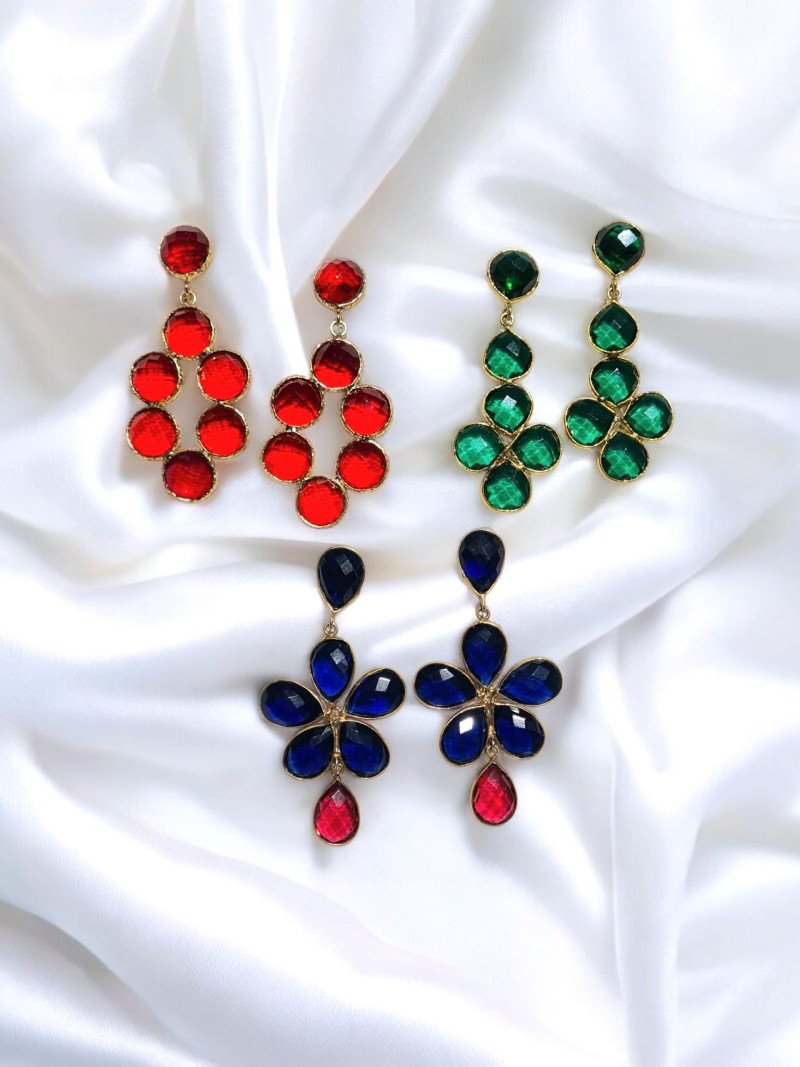 Handmade long earrings with faceted crystals, gold-plated bezels and two- or three-piece designs.