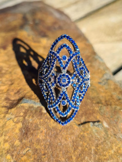 Silver ring with blue cubic zirconia