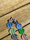 Conjunto collar largo  pendientes piezas planas ojo de gato
