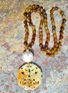 Long necklace of agates, mother-of-pearl and a unique jade medallion