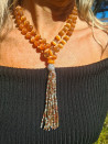 Long cat's eye necklace with a crystal tassel