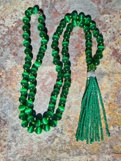 Long cat's eye necklace with a crystal tassel