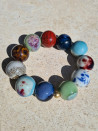 Elastic bracelets with ceramic beads in vibrant colors