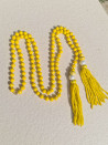 Cord necklace with Czech crystals and pompoms