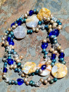 Long necklace of blue baroque pearls and jasper with clasp