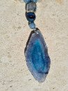Long necklace of blue and ochre agates with a blue agate pendant