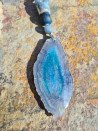 Long necklace of blue and ochre agates with a blue agate pendant