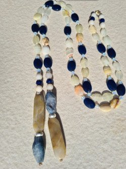 Cord-style necklace of oval blue and ochre agates with crystals