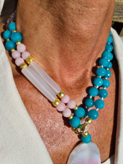 Long necklace of natural stones with agate pendant