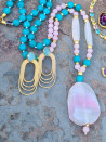 Long necklace of natural stones with agate pendant